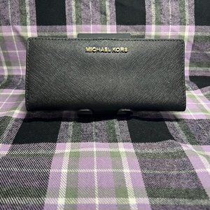 Michael Kors Jet Set Travel Flat Slim Bifold Siffiano Leather Wallet (Black)
